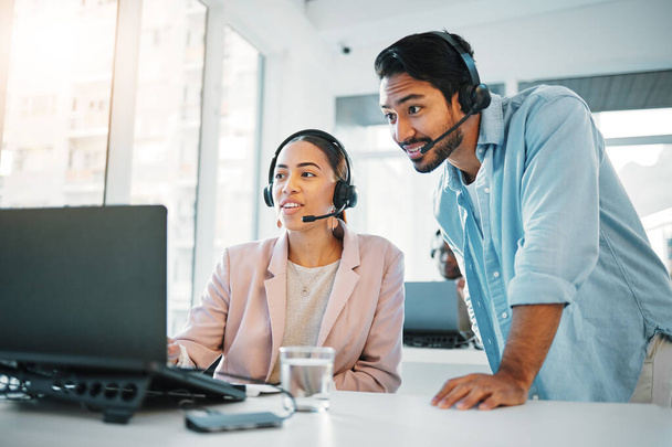 People at call center, training with manager and help, laptop and support with CRM process, customer service and telecom. Working together, team and coaching in office with telemarketing and advice. - Photo, Image