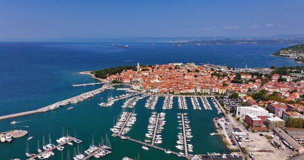 Aerial view of Izola historical town, fishing port, Church of St. Maurus, Adriatic coast, Istria, Slovenia - Photo, Image