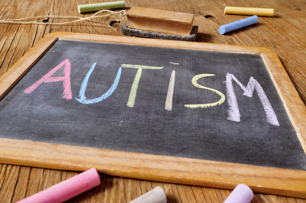 word autism written in a chalkboard - Foto, afbeelding