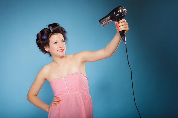 Girl  holding hairdreyer - Foto, Bild