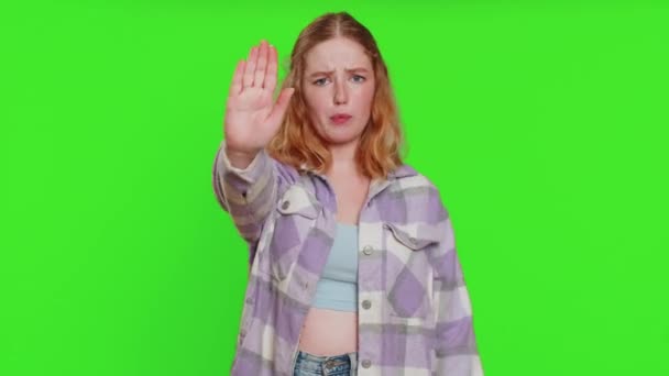 Stop, enough. Caucasian woman say no hold palm folded crossed hands in finish gesture, warning of finish, prohibited access, declining communication body language danger. Girl on chroma key background - Footage, Video