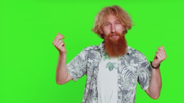 Young man showing wasting throwing sharing money around, more tips, big profit, winning lottery jackpot, successful shopping payment purchase cashback. Redhead guy isolated on chroma key background - Footage, Video