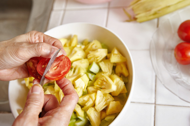 Preparing vegetables for salad - Foto, Imagen