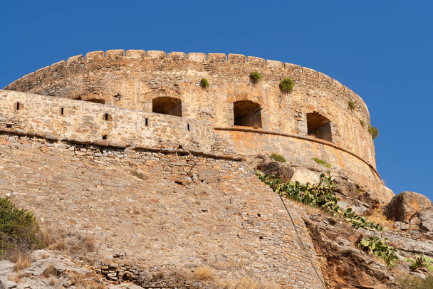 Exterior walls of Spinalonga Fortress, built in the 16th century by the Venetians, in Kalydon, Crete, Greece. - Photo, Image