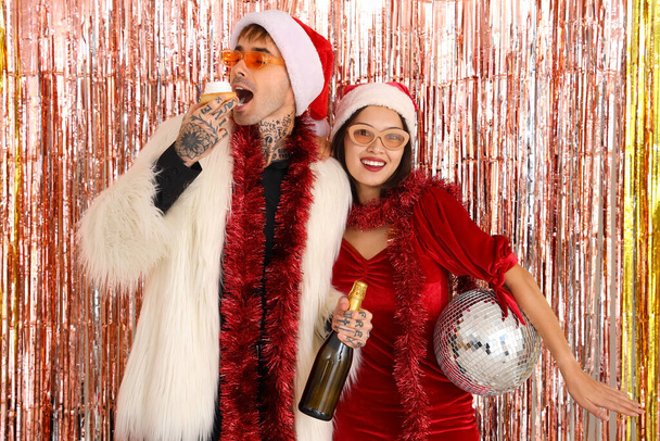 Young friends with disco ball at Christmas party - Photo, Image