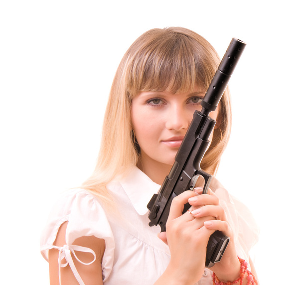 Young woman with gun isolated on white - Foto, immagini
