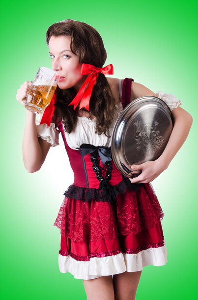 Bavarian girl with tray on white - Valokuva, kuva