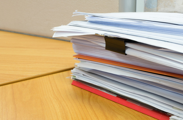 pile of documents on the office desk - 写真・画像