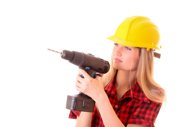 Young woman in helmet with drill isolated on white - Φωτογραφία, εικόνα