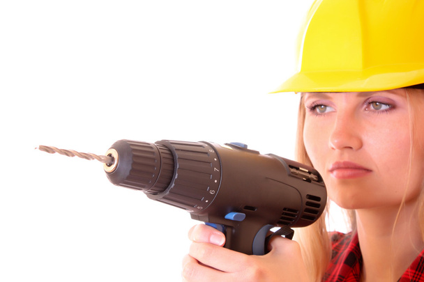 Young girl with drill isolated on white - Foto, Bild