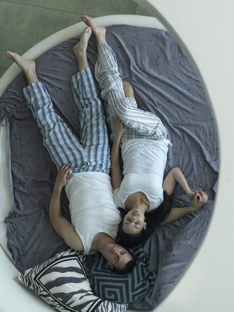 Couple relax and have fun in bed - Фото, изображение