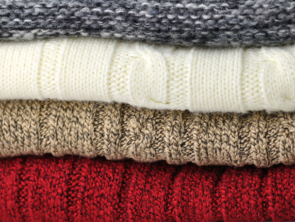 Pila de suéteres
 - Foto, imagen