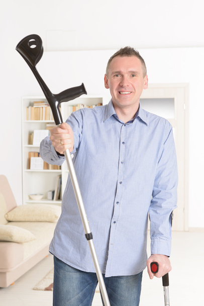Man with crutches - Photo, Image