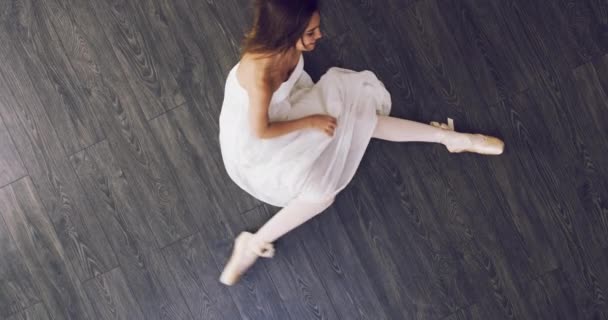 Above, ballet and portrait of dancer on the floor in splits with legs, dancing and stretching in class or studio. Creative, movement and athlete training for performance or show on the ground. - Footage, Video