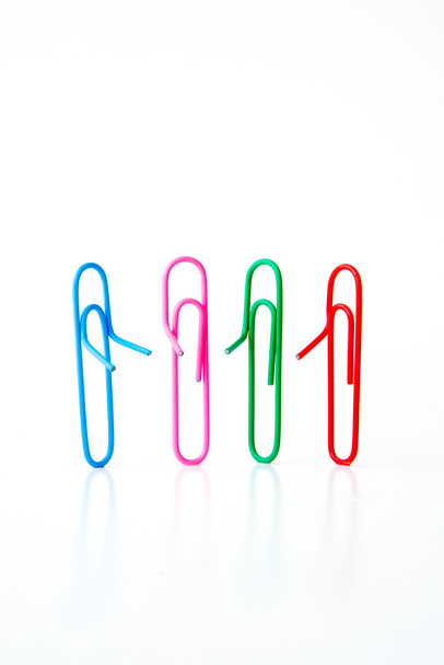Variety of colorful paper clips on white background : family talk together concept - Photo, Image