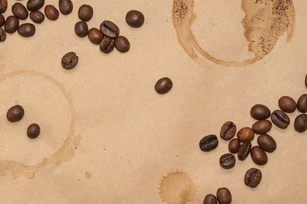 coffee beans and cup spot on kraft background - Photo, Image