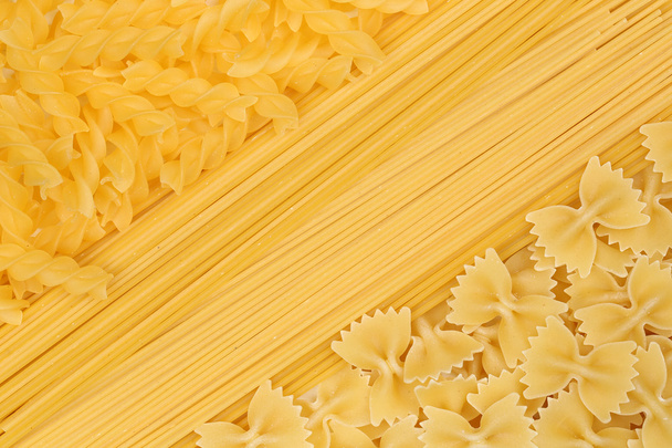 Noodles pasta spaghetti penne rigate background - Fotoğraf, Görsel