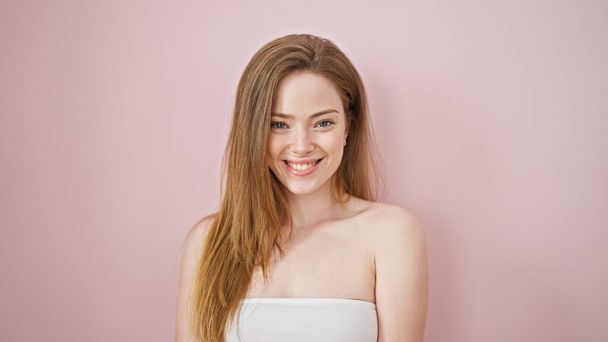 Young blonde woman smiling confident standing over isolated pink background - Foto, Imagem