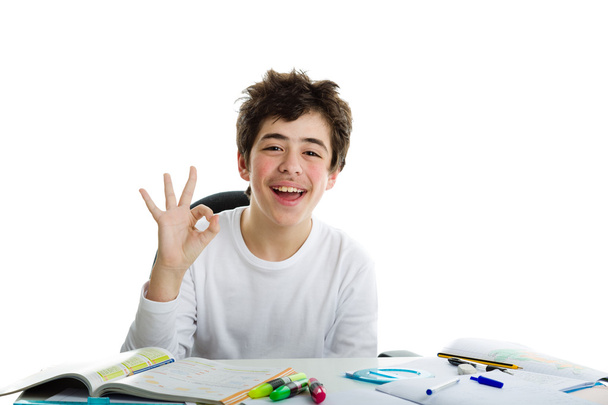 Poika osoittaa menestystä OK kotitehtäviä
  - Valokuva, kuva