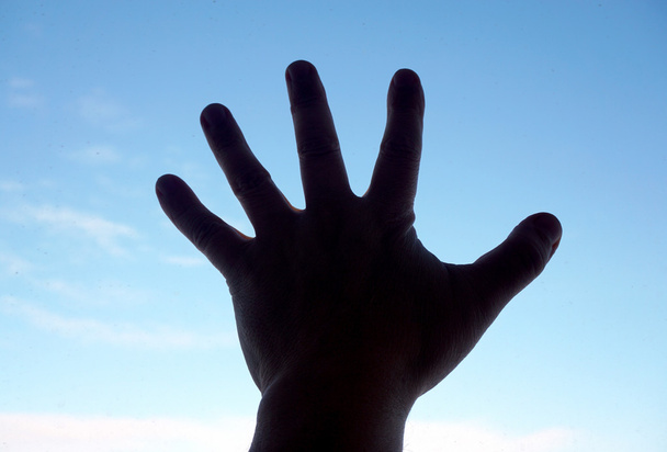 gökyüzü arka plan üzerinde insan eli - Fotoğraf, Görsel