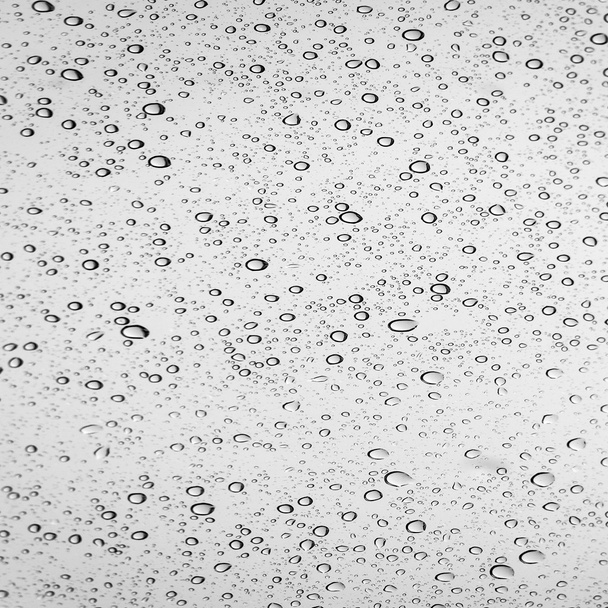 Краплі дощу на віконному склі
 - Фото, зображення