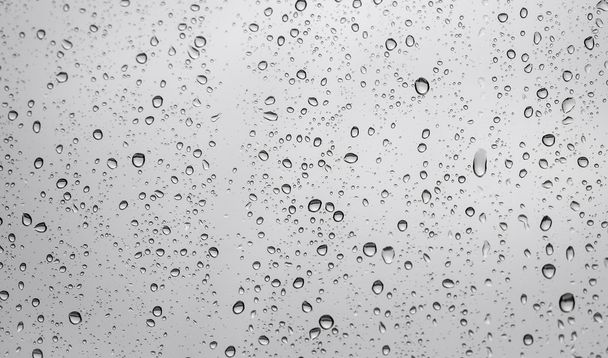 Gotas de lluvia en vidrio de ventana - Foto, imagen