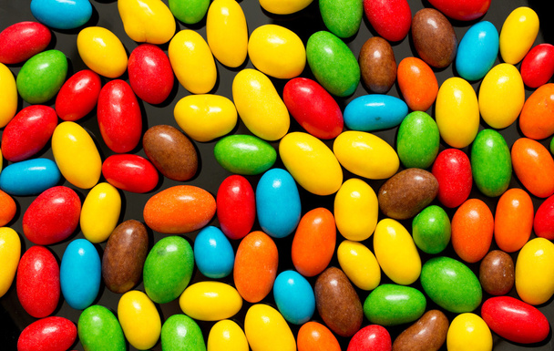 Купка барвистих цукерок
 - Фото, зображення