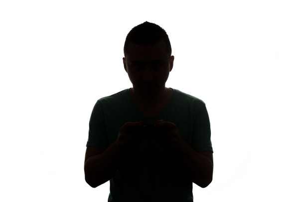 Silhouette Man Mysterious Face On A White Background - Zdjęcie, obraz