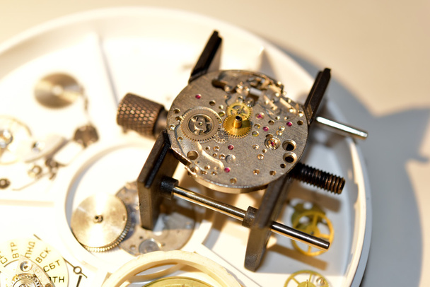 Steel clockwork of old wristwatch isolated - Photo, Image