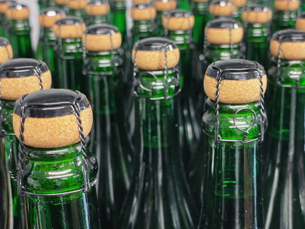 corded cider bottles in a distillery - Photo, Image