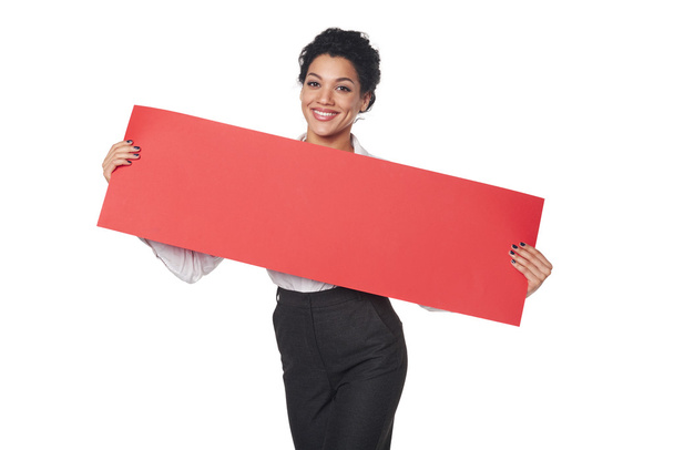 Happy businesswoman holding banner - Fotó, kép