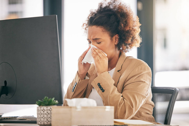 Corporate, blowing nose and woman with a sneeze, sick or allergies with virus, fatigue or health issue while working at office. Female person, employee or allergy with illness, cold or flu with sinus. - Photo, Image