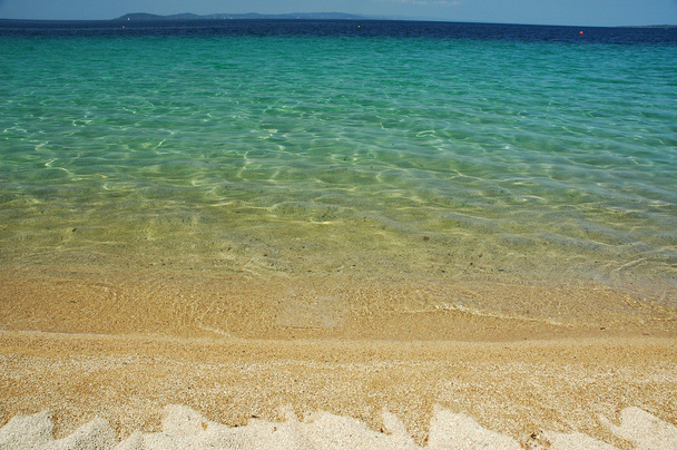 Aguas de playa Toroni
 - Foto, imagen