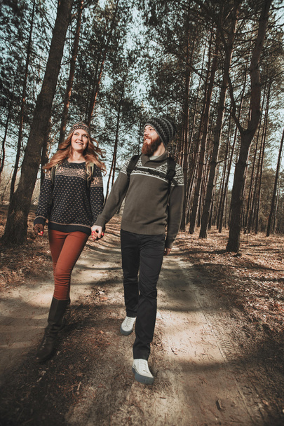 Happy couple walking in the wood - Foto, Imagen