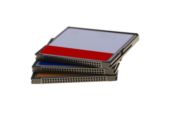 Três CF cartão de memória isolado no fundo branco
 - Foto, Imagem