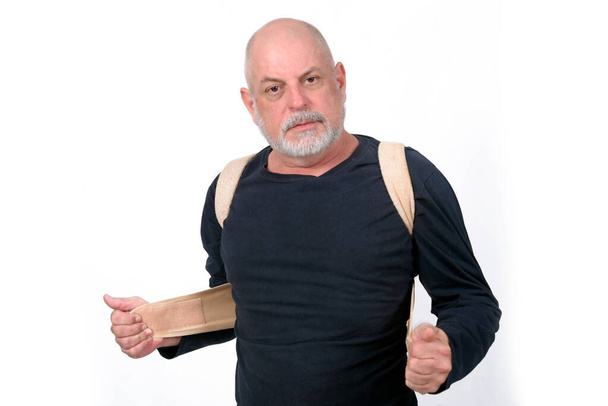 adult man using SeniorLife tablet notebook cell phone communication technology - Photo, Image