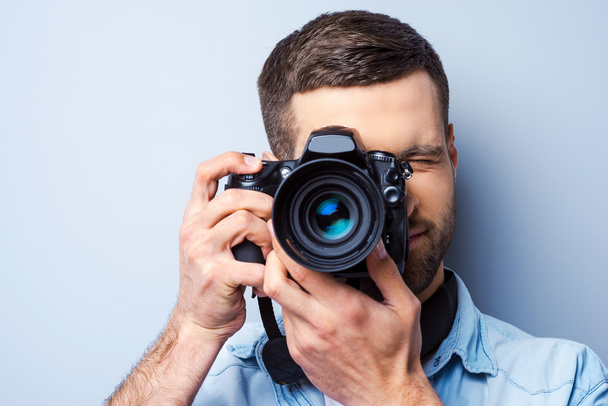 Handsome young man photographing you - Foto, Imagem