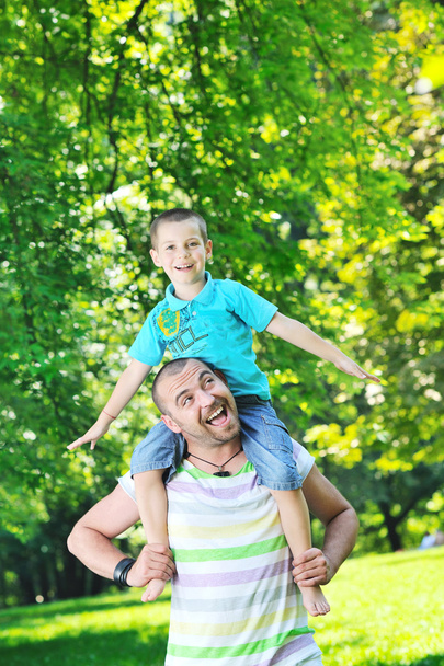 Happy father and son have fun at park - Fotografie, Obrázek