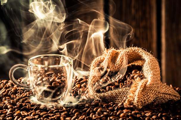 Coffee sack full of aroma seeds - Foto, imagen