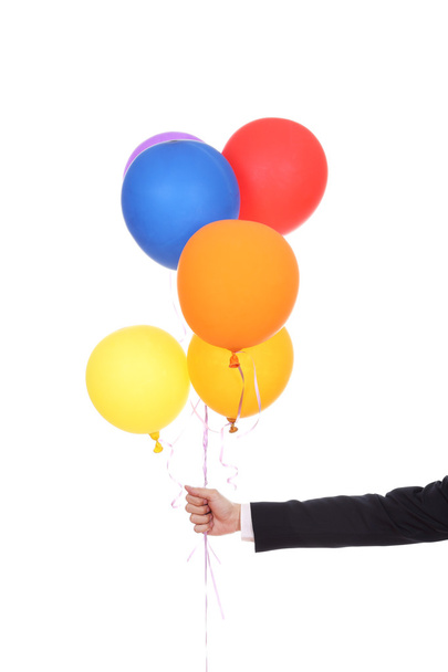 business hand with colorful balloons  - Photo, Image