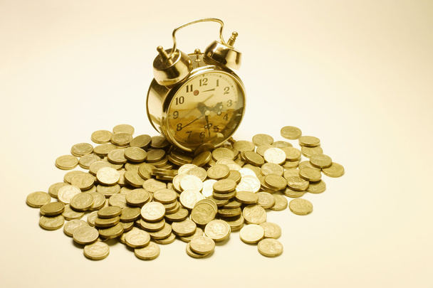 Alarm Clock and Coins - Фото, изображение