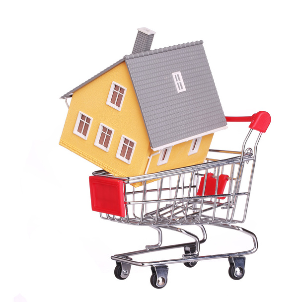 House in shopping cart isolated. Mortgage concept - Foto, immagini