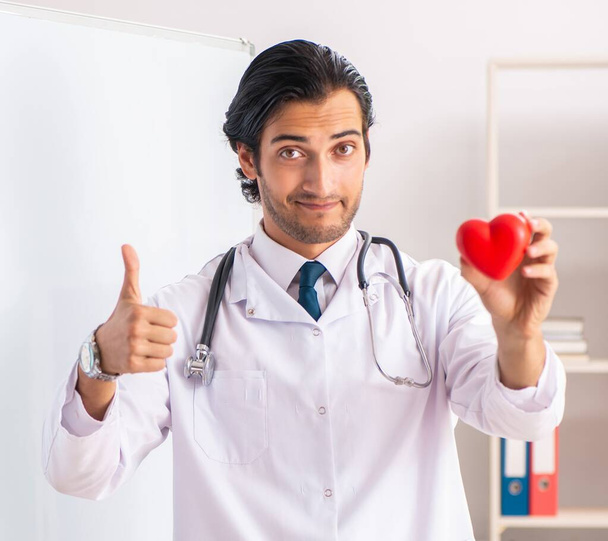 The young doctor in front of whiteboard - Photo, Image