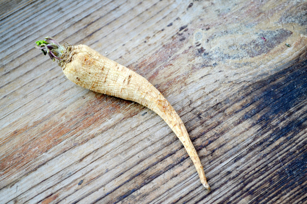 Parsley root on wooden table - Photo, Image