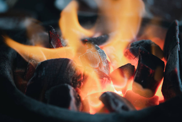 Burn charcoal in stove for cooking. Close up - Photo, Image