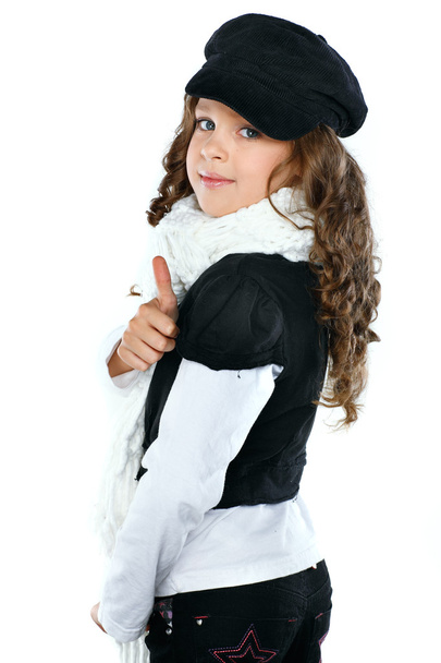A little beautiful girl is in autumn clothes, isolated on a white backgroun - Фото, зображення