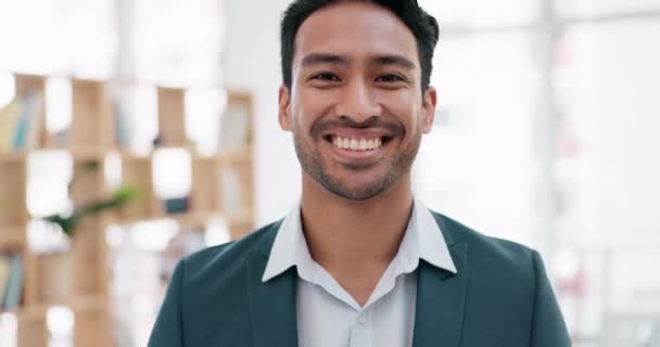Laughing, face and an Asian man in an office for a corporate job, professional career and happy as lawyer. Smile, working and portrait of a businessman at an law agency or company firm for legal work. - Footage, Video
