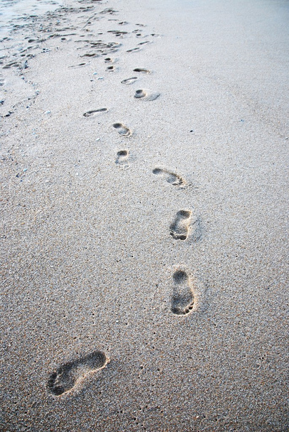 Footprints in sand - Foto, afbeelding