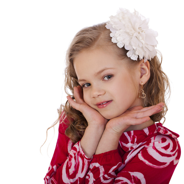 Portrait of a charming little girl looking at camera - Foto, Bild