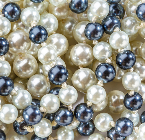 Corde de perles noires et blanches
 - Photo, image